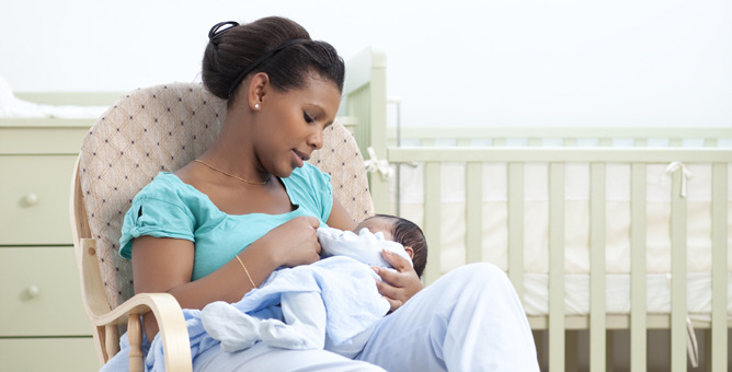 Mother breastfeeding infant